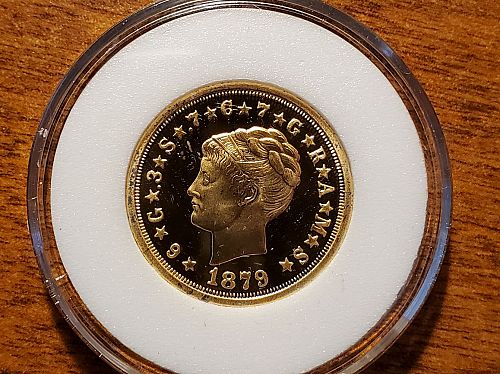 REPLICA of a 1879 Dollar gold piece (STELLA)