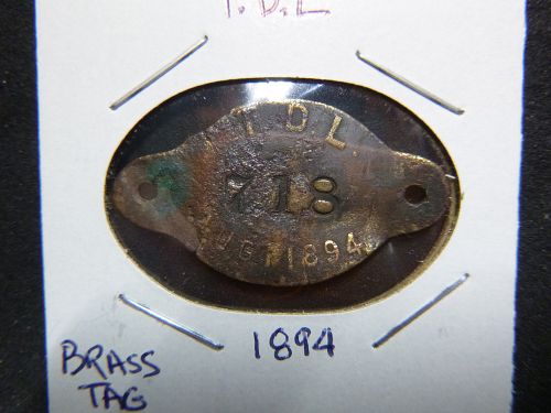 T.D.L. 1894 BRASS TAG