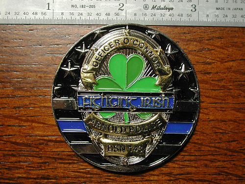 Arnold,MO Police So many Badges one big Family token NICE Fighting Irish