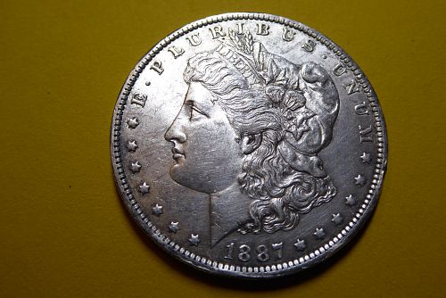 1887o Fine Morgan$ with high relief front & reverse, & 90% silver.