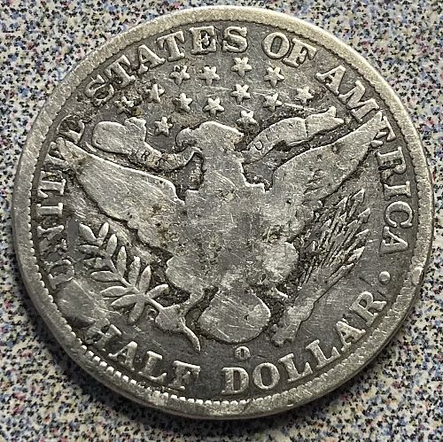 1901O half dollar full rims coin has been cleaned