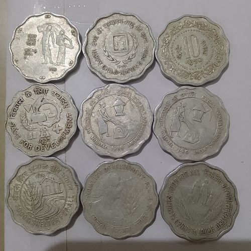 9 different circulated india coins..