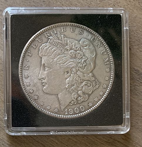1900 P Morgan Silver Dollar. Very nice coin, slightly circulated w/ nice toning # 52