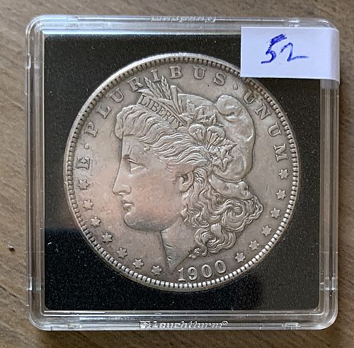 1900 P Morgan Silver Dollar. Very nice coin, slightly circulated w/ nice toning # 52