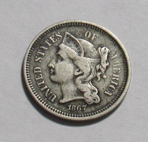 1867 P Nickel Three Cents in circulated condition