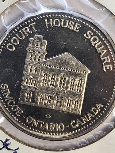 1976 Simcoe Ontario $1 Dollar Trade token Uncirculated Simcoe Court House