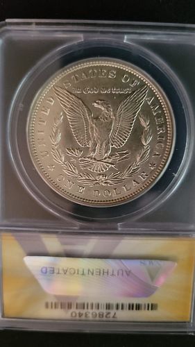 1884 Morgan Dollar AU58