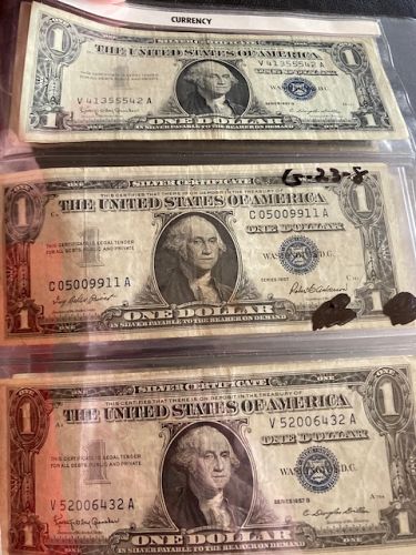 Huge lot of old US $1 Silver Certificate notes. Awesome leather folder. See pictures.