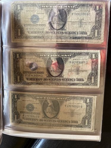 Huge lot of old US $1 Silver Certificate notes. Awesome leather folder. See pictures.
