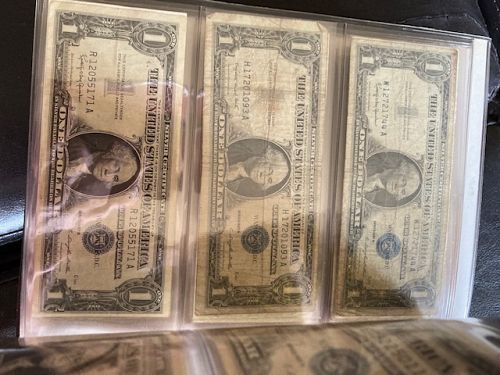 Huge lot of old US $1 Silver Certificate notes. Awesome leather folder. See pictures.