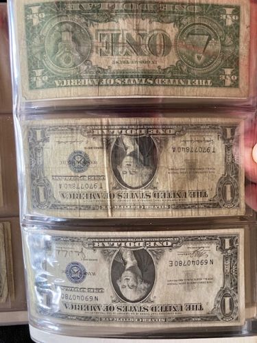 Huge lot of old US $1 Silver Certificate notes. Awesome leather folder. See pictures.