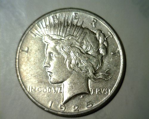 1925   SILVER  PEACE DOLLAR  ABOUT  UNCIRCULATED  NO RESERVE!!!!