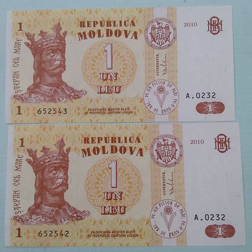 Foreign UNC pair..1 UN LEU MOLDOVA