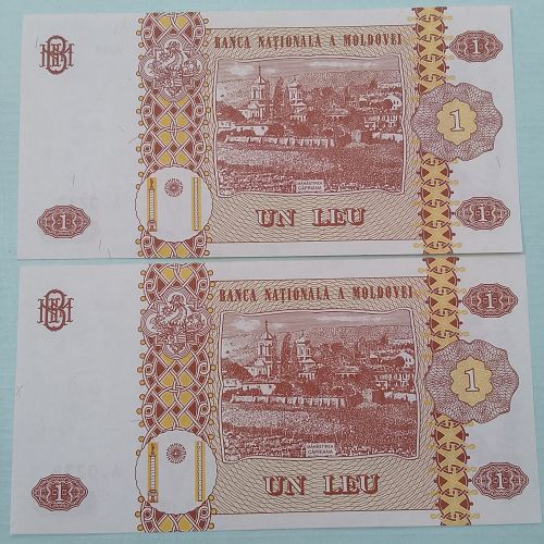 Foreign UNC pair..1 UN LEU MOLDOVA