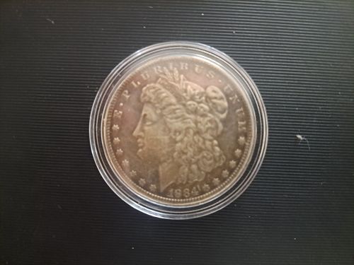 1884-O MORGAN SILVER $1  VG