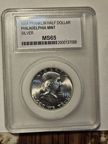 PCC graded 1954 franklin half