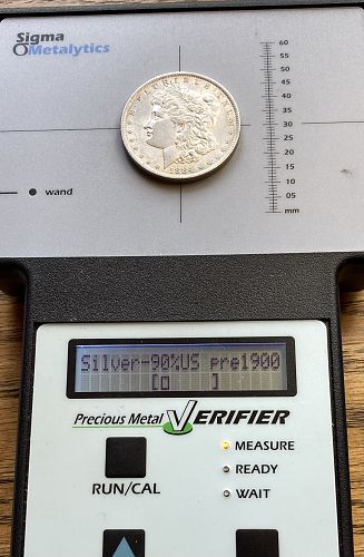 1884O Morgan dollar in ALMOST UNCIRCULATED condition