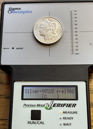 1887 Morgan dollar in ALMOST UNCIRCULATED condition