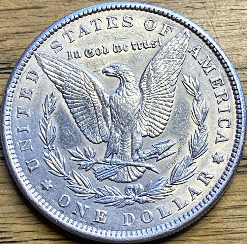 1900 Morgan dollar in ALMOST UNCIRCULATED condition