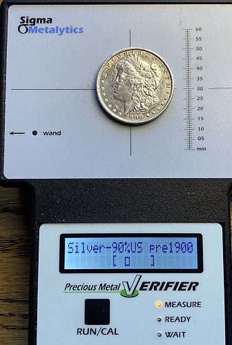 1900 Morgan dollar in ALMOST UNCIRCULATED condition