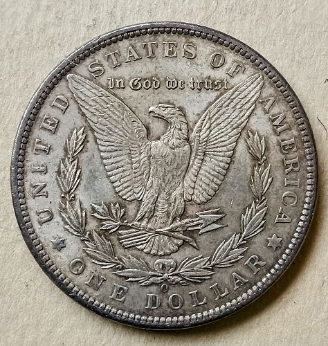 1897 O Morgan Silver Dollar • .900 Silver • Better Date • Nice Toning • AU