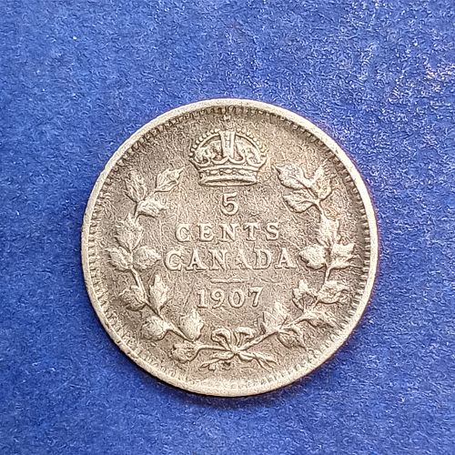 CANADA 1911 5 CENT OLD SILVER 92.5% STERLING SILVER.  Mintage 5.2 mil.  survivors??
