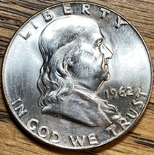 1962D Franklin half In MINT STATE condition