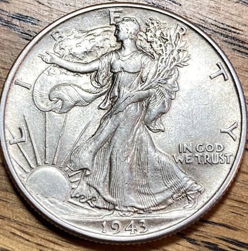 1943 walking liberty half in ALMOST UNCIRCULATED condition nice problem free coin