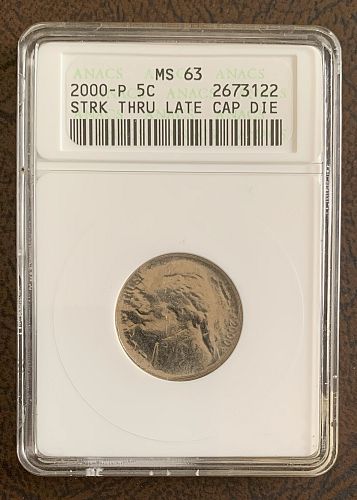 MS63 Graded Struck Thru Late-Stage Capped Die Jefferson Nickel Mint Error
