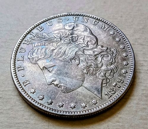 1879 Morgan Silver Dollar • .900 Silver • Nice Toning • AU