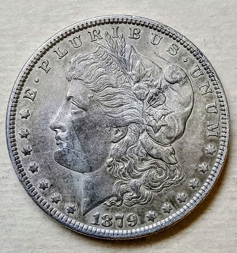 1879 Morgan Silver Dollar • .900 Silver • Nice Toning • AU