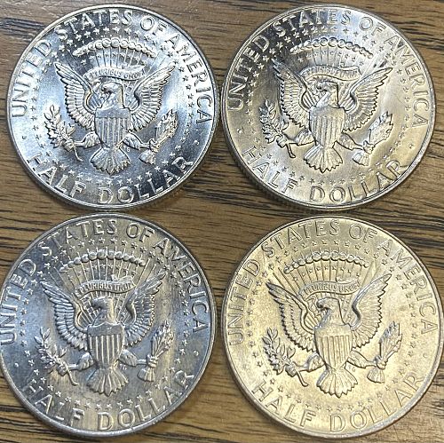 4 1964 Kennedy half dollars in MINT STATE condition