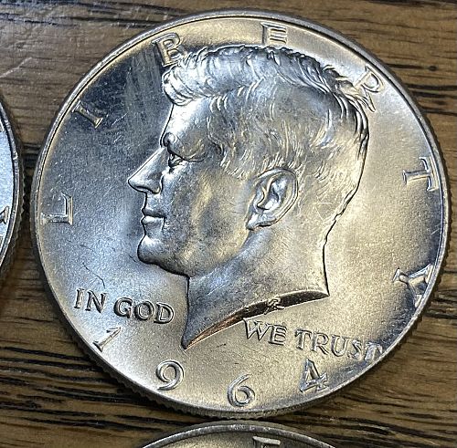 4 1964 Kennedy half dollars in MINT STATE condition