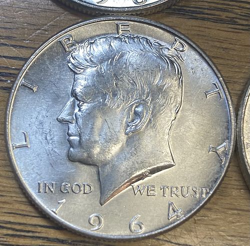 4 1964 Kennedy half dollars in MINT STATE condition