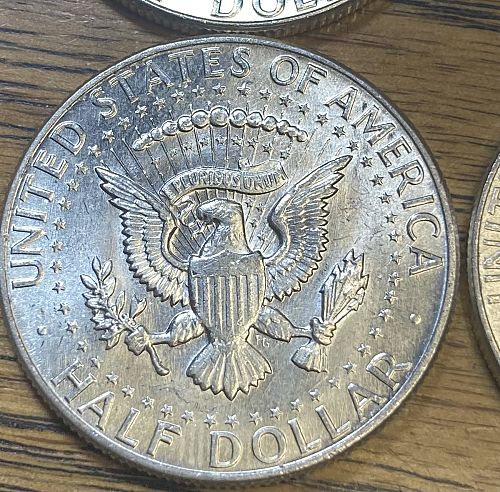 4 1964 Kennedy half dollars in MINT STATE condition