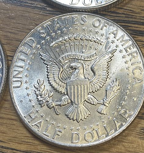 4 1964 Kennedy half dollars in MINT STATE condition
