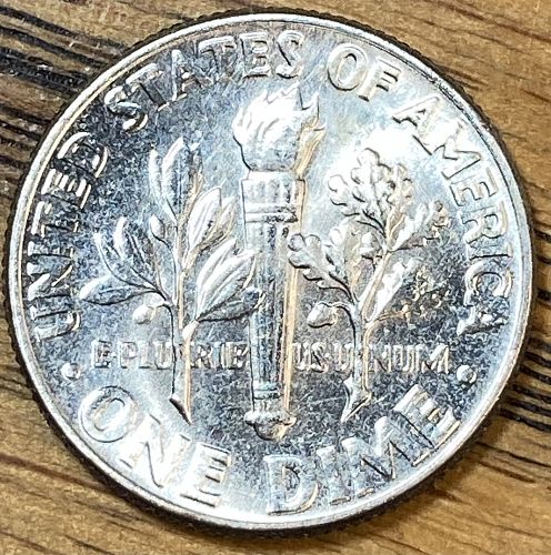 1959 Roosevelt dime in MINT STATE condition