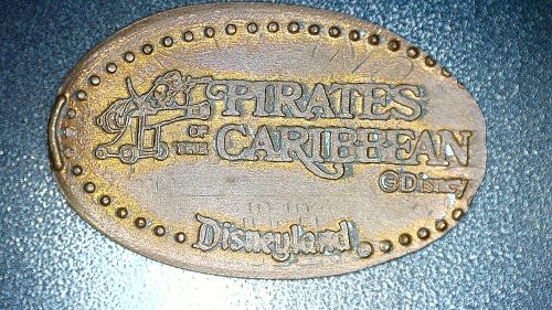 PIRATE on CANNON PIRATES of CARIBBEAN DISNEYLAND PRESSED RETIRED DISNEY PENNY