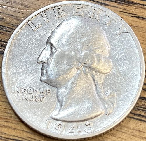 1943S Washington quarter in VERY FINE condition appears cleaned