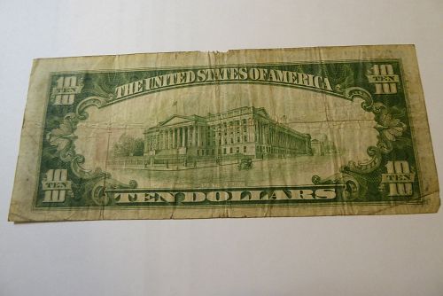 1929 $10 bill with red lettering in fair condition