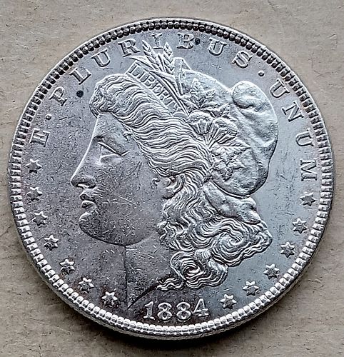 1884 Morgan Silver Dollar • .900 Silver • Full Luster • BU
