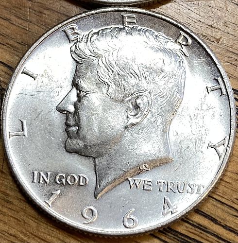 4 silver half dollars 1906-1964 in ALMOST GOOD-ALMOST UNCIRCULATED condition lot 4A
