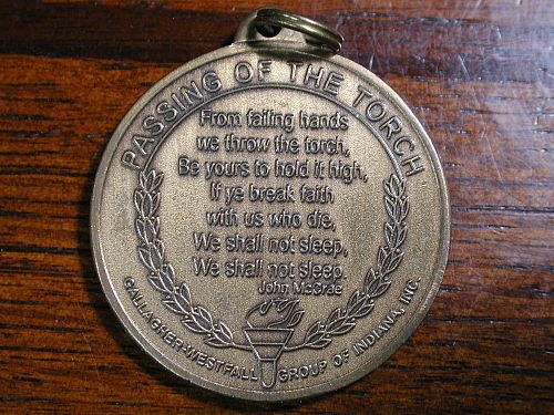 Passing  the Torch Medallion  NICE !
