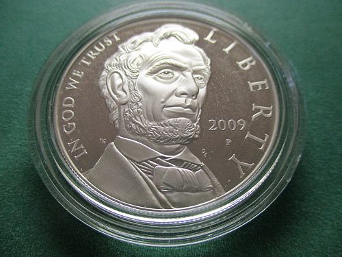 2009  Proof Abraham Lincoln Commemorative Silver Dollar.  Item: CM 09 AL PR.