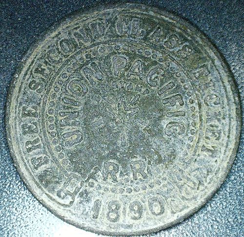 UPRR (Union Pacific Railroad) white metal Free Second Class ticket dated 1890