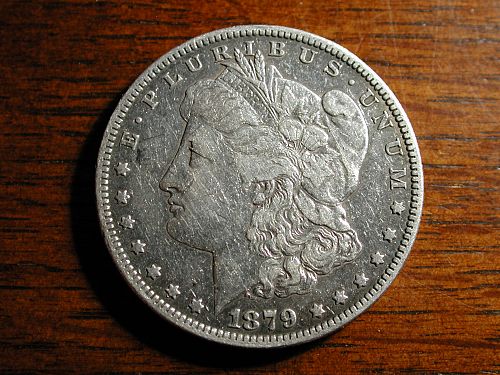 1879s REV of 79 Morgan Silver Dollar NICE !