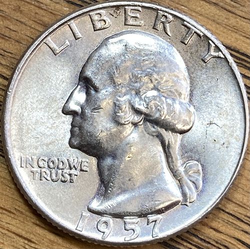 1957D Washington quarter in ALMOST UNCIRCULATED condition