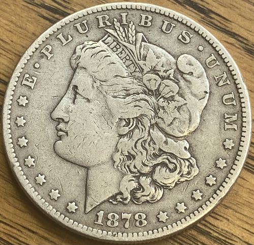 1878 8 tail feathers Morgan dollar in VERY FINE condition