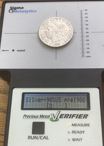 1889 Morgan dollar in ALMOST UNCIRCULATED condition