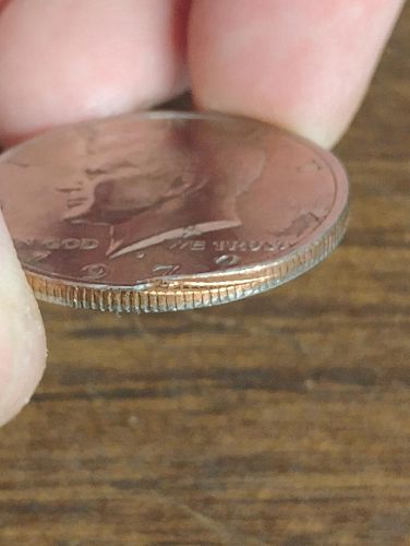1972-d kennedy half dollar au-58 out of collar error coin